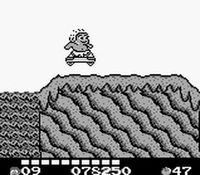 une photo d'Ã©cran de Adventure Island 2 - Aliens in Paradise sur Nintendo Game Boy